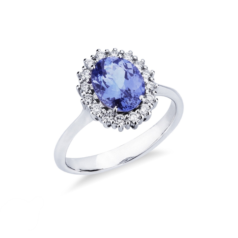 Bague halo en or blanc 18k avec Tanzanite et diamants. 
