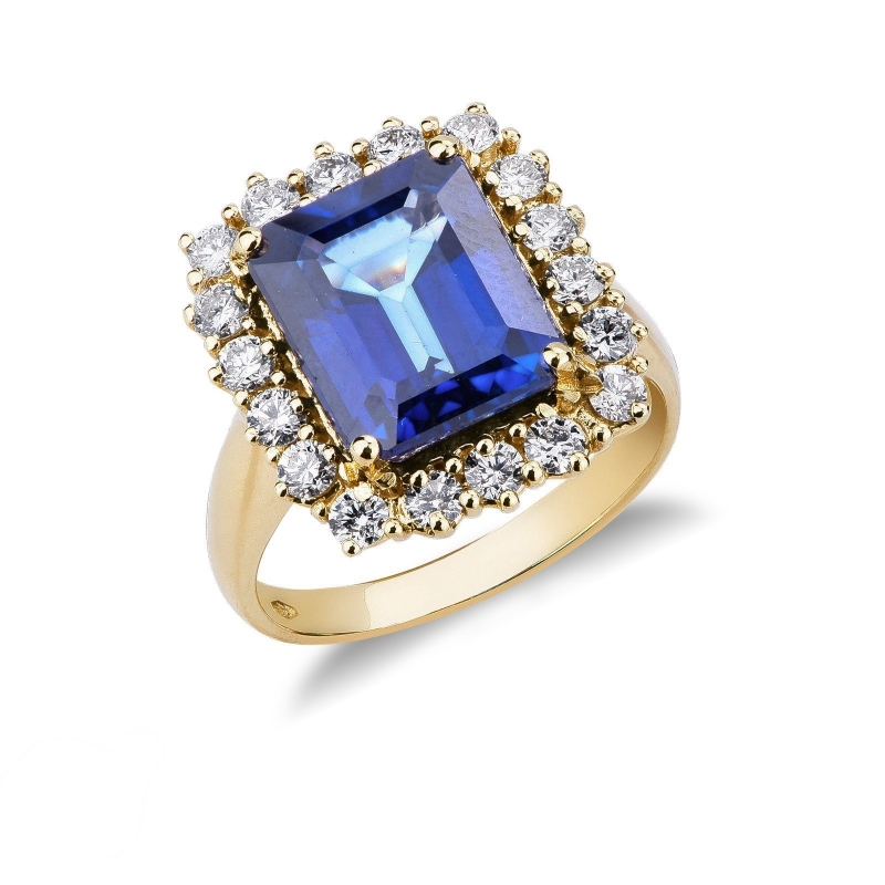 Bague halo en or jaune 18k avec saphir bleu et diamants