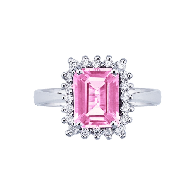 Bague en or blanc avec saphir rose et halo de diamants
