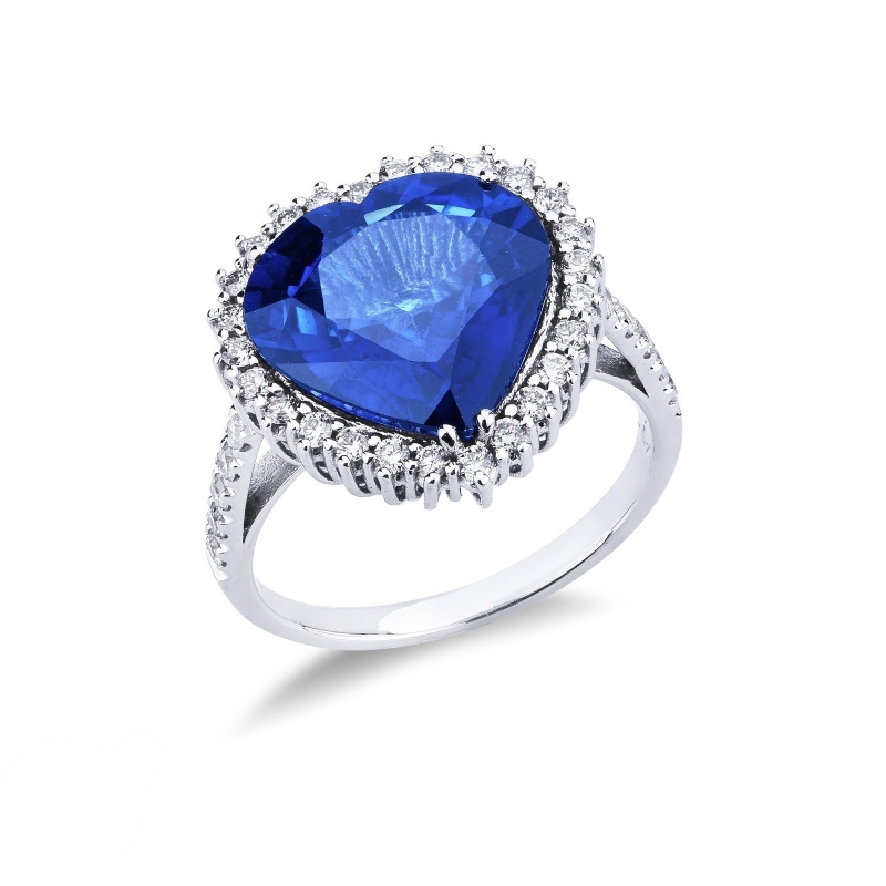 Bague halo en or blanc 18 carats avec saphir bleu