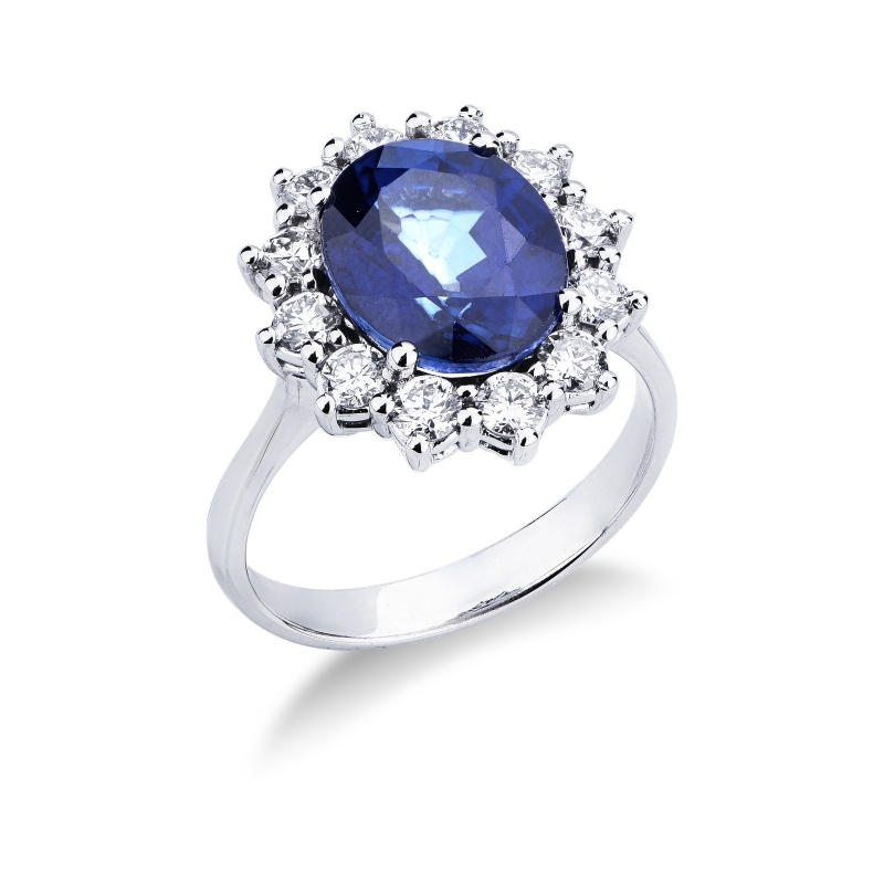 Bague halo en or blanc 18 carats avec saphir bleu ovale et diamants