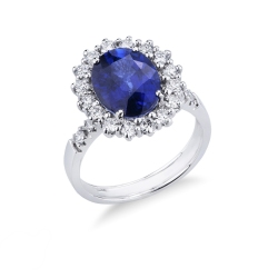Bague or blanc avec saphir bleu et diamants