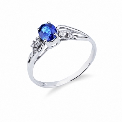 Bague bandeau en or blanc avec saphir bleu ovale et diamants