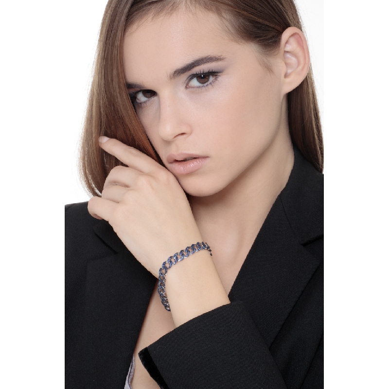 Bracelet gourmette en or blanc 18K avec saphirs bleus