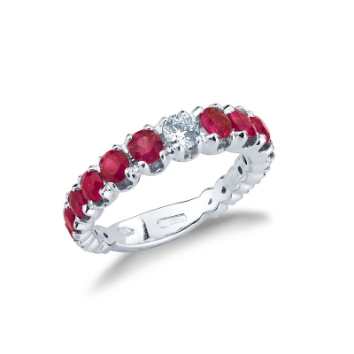 Bague en Or Blanc 18k avec Diamant Central et Rubis Latéraux