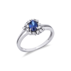 Bague avec diamants et saphir bleu ovale central en or blanc 18k