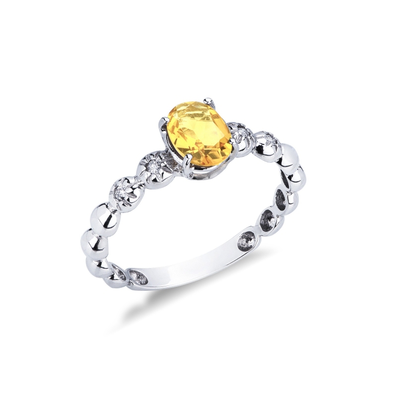 Bague en or blanc 18 carats avec un citrine et 2 diamants 