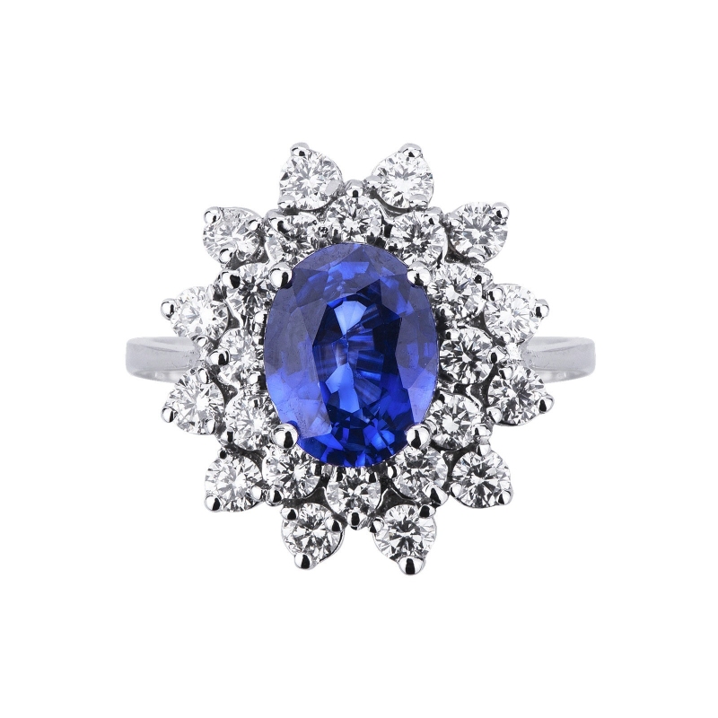 Bague double halo en or blanc 18 carats avec un saphir bleu