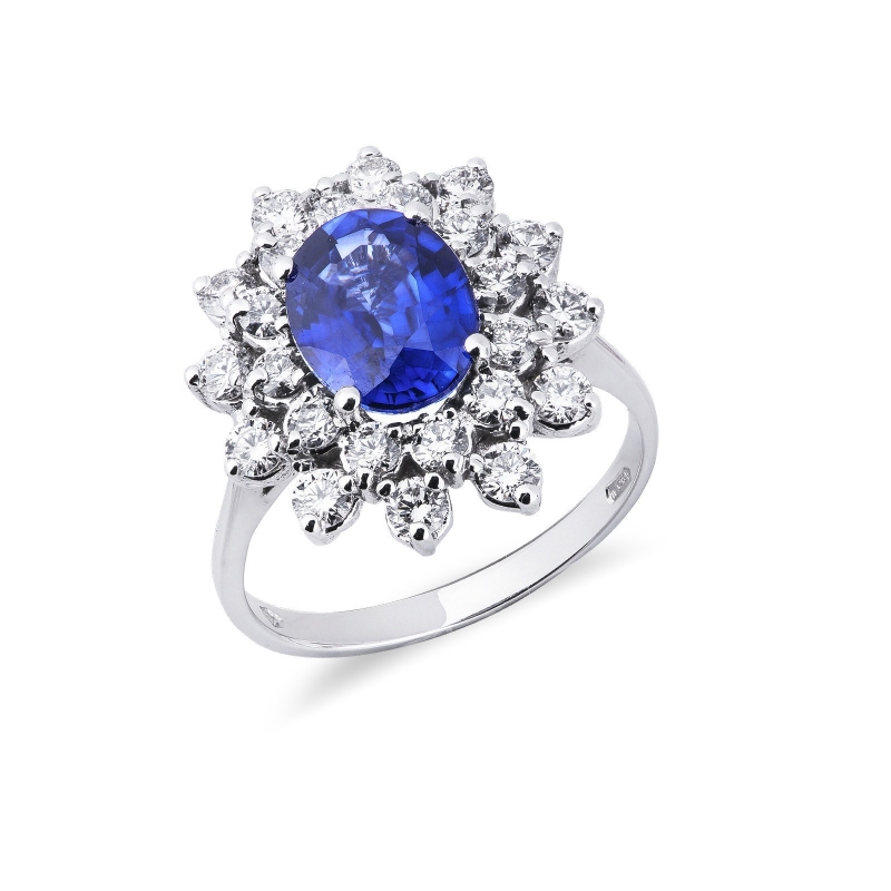 Bague double halo en or blanc 18 carats avec un saphir bleu