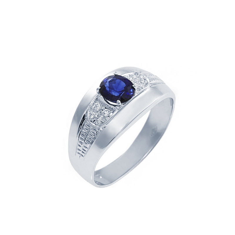 Bague en or blanc 18k avec saphir bleu et diamants