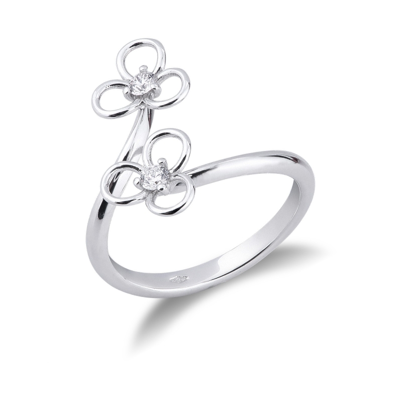 Bague en or blanc 18k avec deux fleurs stylisées et diamants