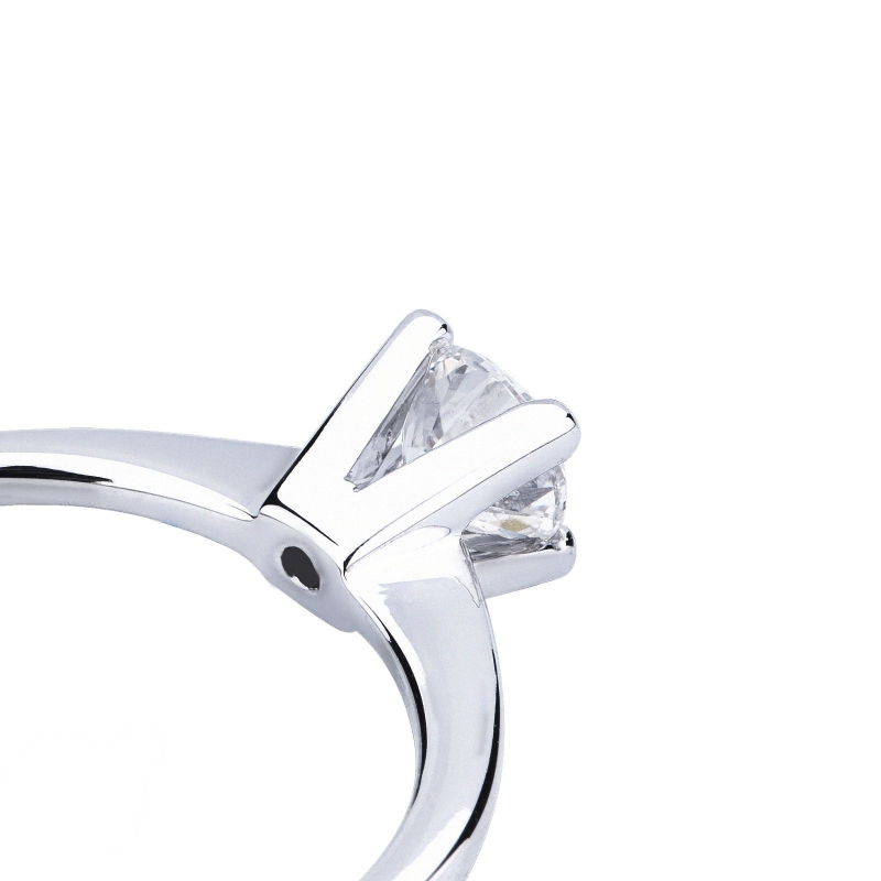 Bague solitaire diamant 0,50 ct or blanc 18k quatre griffes