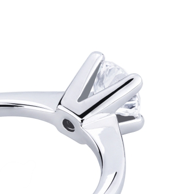 Bague solitaire diamant 0,70 ct or blanc 18k quatre griffes