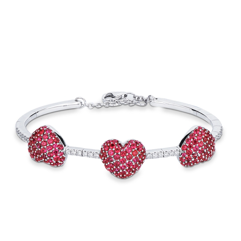 Bracelet en or blanc et diamants avec trois cœurs en rubis