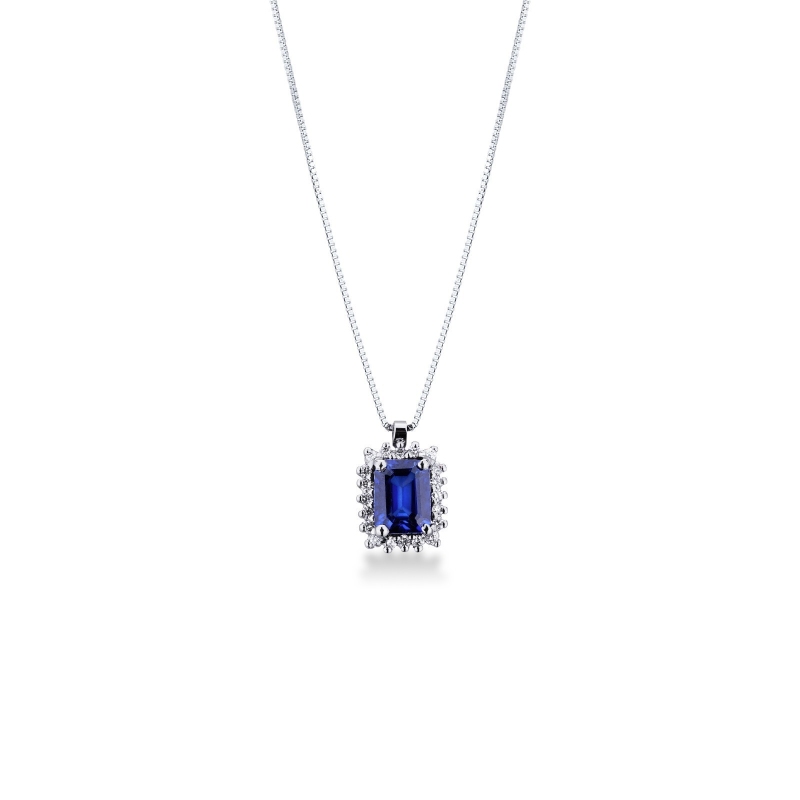 Collier en or blanc 18k saphir bleu taille émeraude et diamants