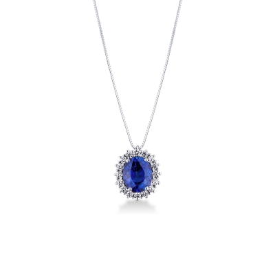 Pendentif en or blanc 18 ct avec saphir bleu taille ovale et halo diamants