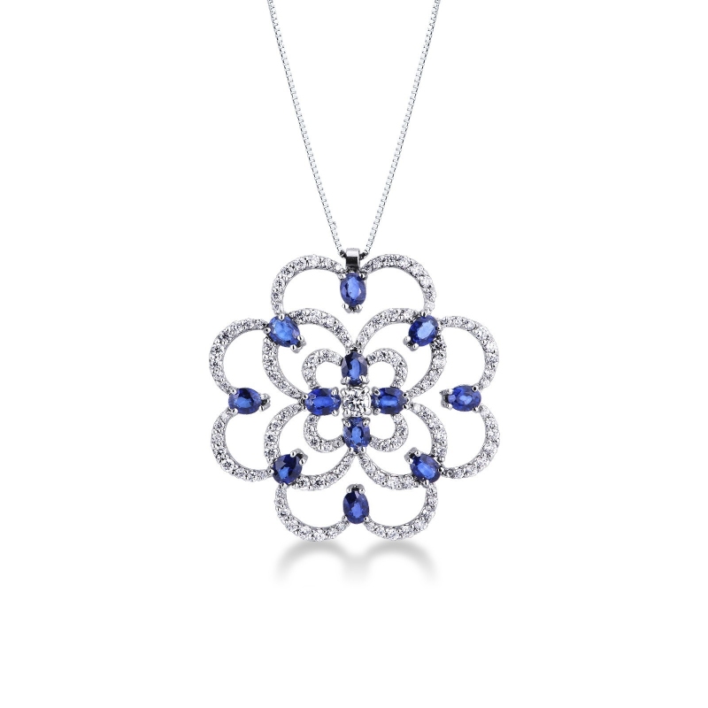 Collier fleur en or blanc 18k avec pendentif de saphirs bleus et diamants