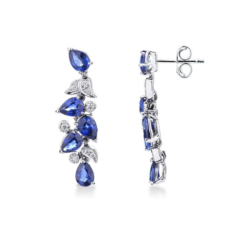 Boucles d'oreilles design fleur en or blanc 18k avec diamants et saphirs bleus