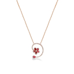 Collier en or rose 18k avec fleur en rubis