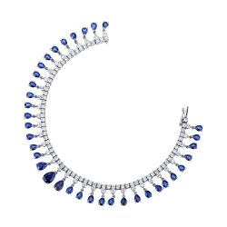 Bracelet tennis en design en or blanc 750 avec saphirs bleus et diamants