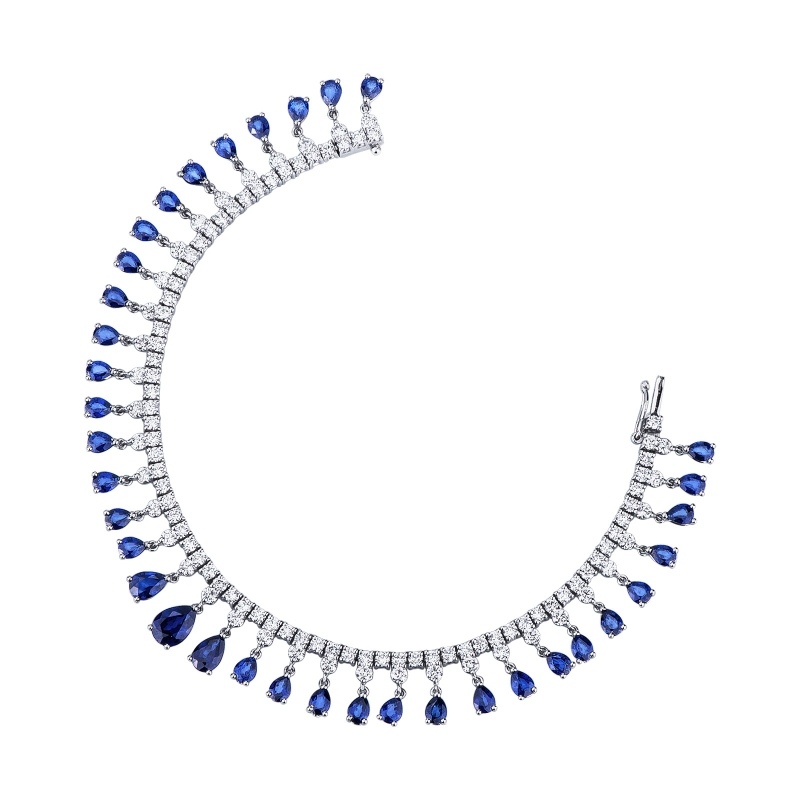 Bracelet tennis en design en or blanc 750 avec saphirs bleus et diamants