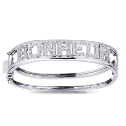 Bracelet rigide avec l'inscription BONHEUR en or blanc 18k