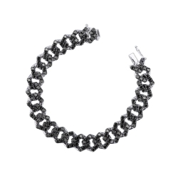 Bracelet groumette en or blanc 18k avec diamants noirs. Pointes brunies.