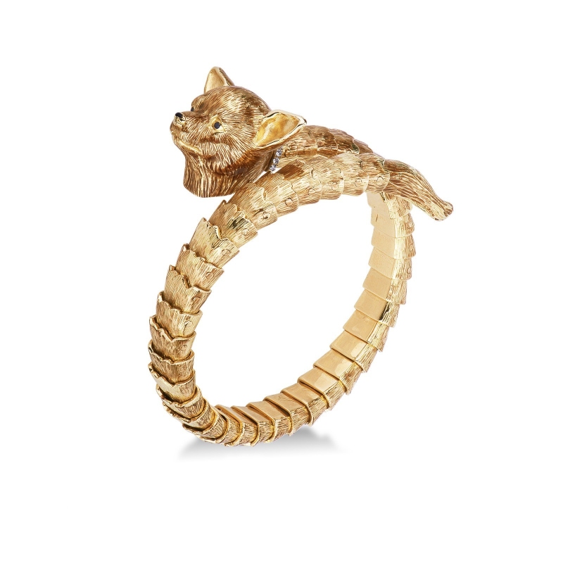 Bracelet semi-rigide en or jaune en forme de chien avec diamants