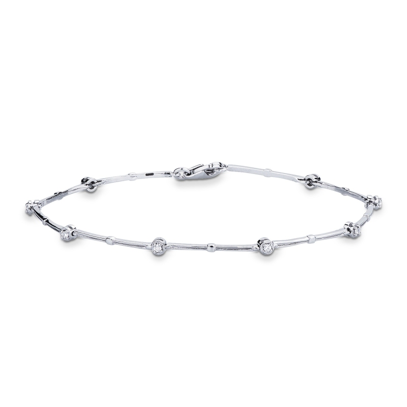 Bracelet tennis alterné en or blanc 18 carats avec diamants