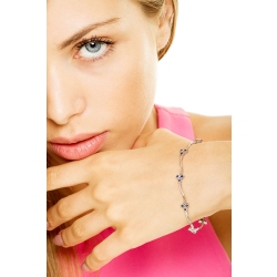 Bracelet semi rigide en or blanc 18k avec fleurs et saphirs bleus 2