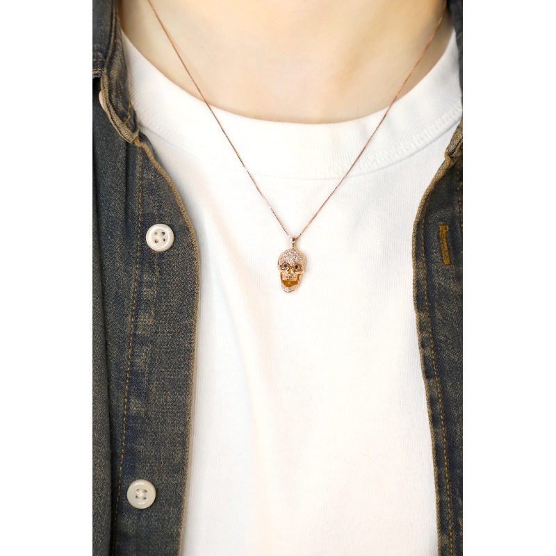 Collier en or rose 18k avec pendentif tête de mort mobile