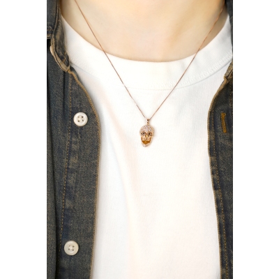 Collier en or rose 18k avec pendentif tête de mort mobile