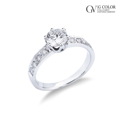 Bague type solitaire en or blanc 18 carats avec diamant central 1.00 ct