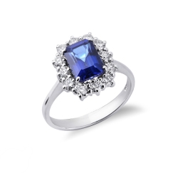 Bague halo en or 18k avec saphir bleu et diamants
