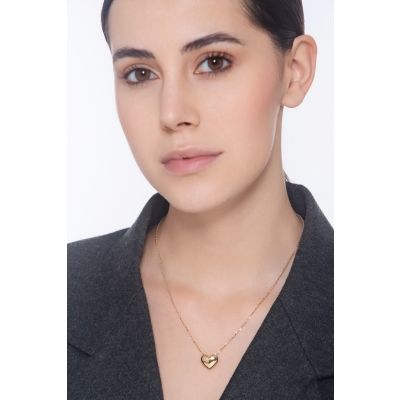 Magnifique collier en or jaune 18k orné d’un pendentif en forme de cœur bombé 