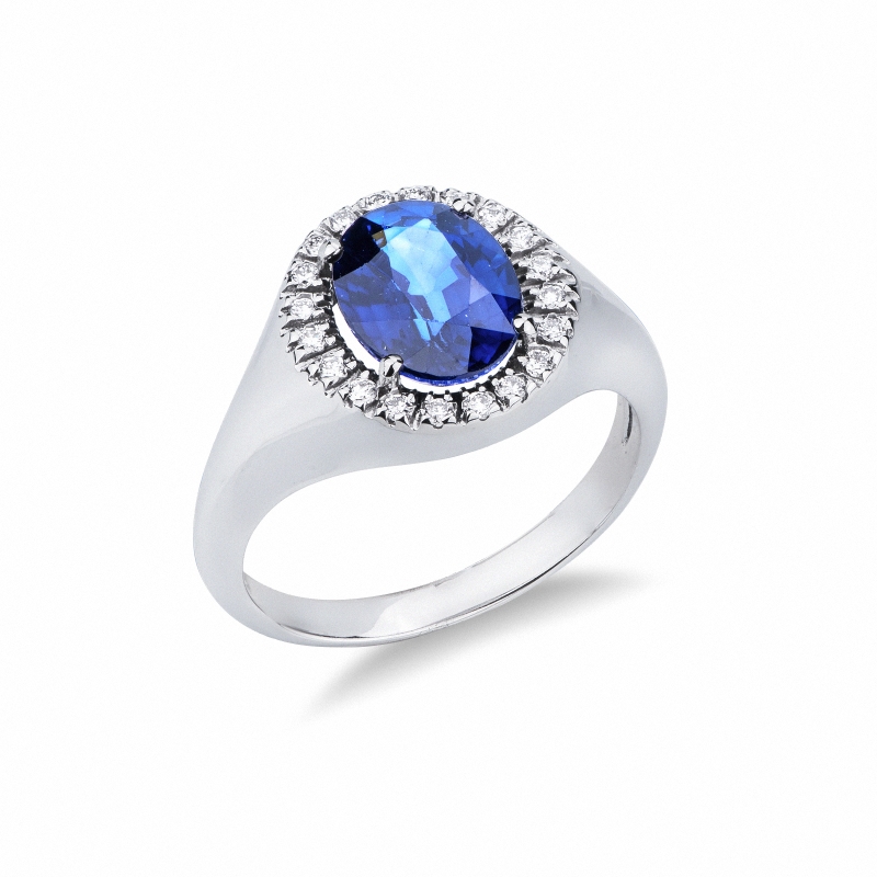 Bague chevaliere en or 18k avec saphir bleu ovale et diamants