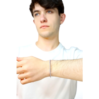 Bracelet tennis griffe elastique en or blanc 750 avec diamants