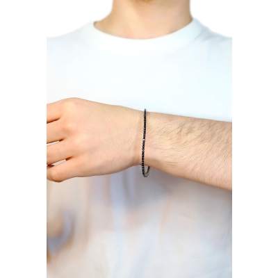 Bracelet tennis elastique en or blanc 18k avec diamants noirs