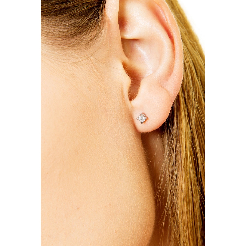 Puces femme diamant 0.20 ct 6 griffes or blanc 18k