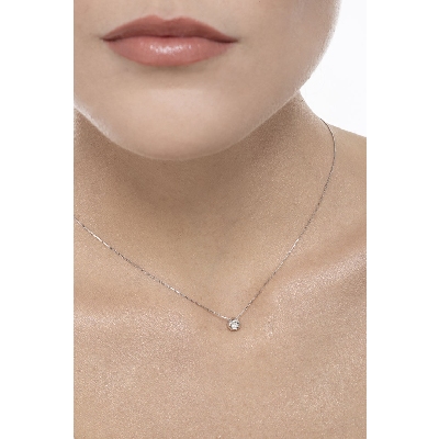 Pendentif solitaire diamant serti clos 0.05 ct or blanc 18k