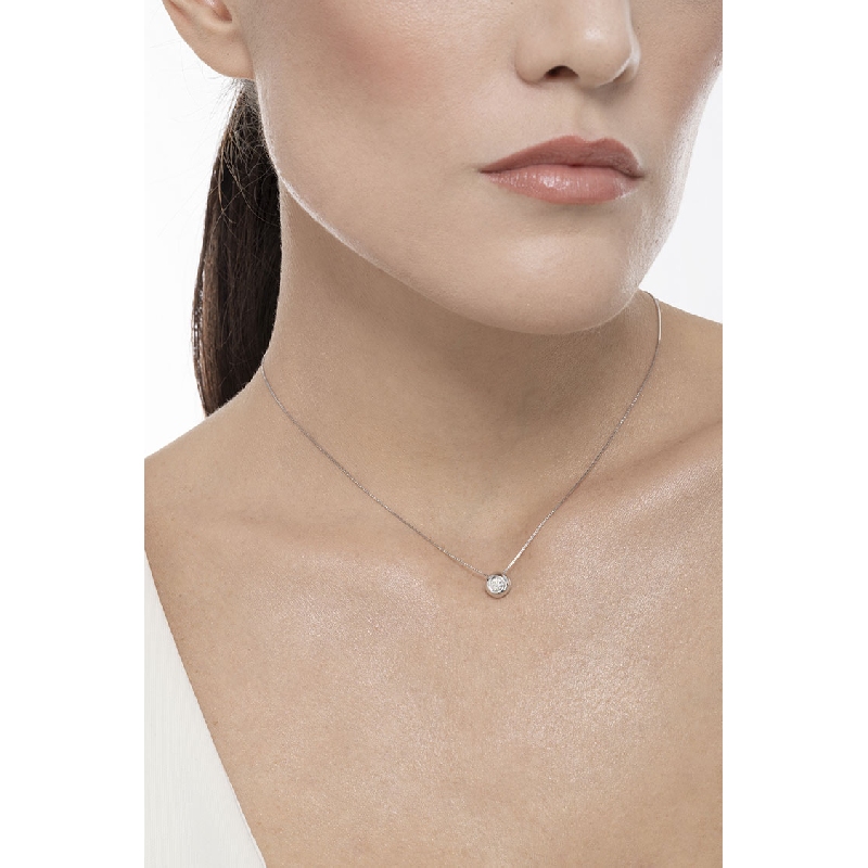 Collier pendentif solitaire avec diamant serti clos 0.15 ct
