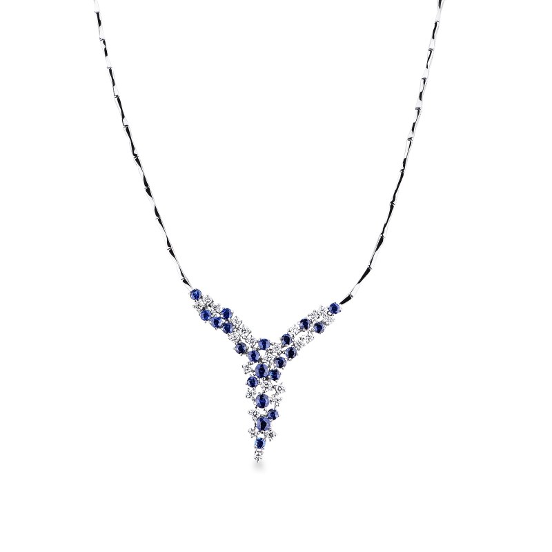 Collier en Y semirigide en or blanc 18k avec cascade de saphirs bleus et diamants