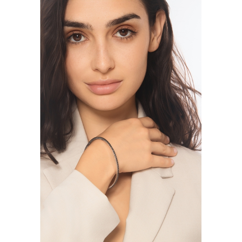 Bracelet tennis elastique en or blanc 18k avec diamants noirs