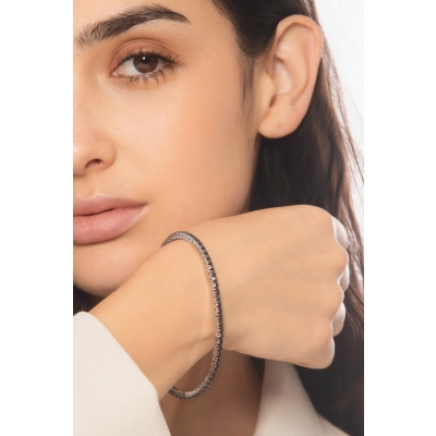 Bracelet tennis elastique avec diamants noirs en or blanc 750