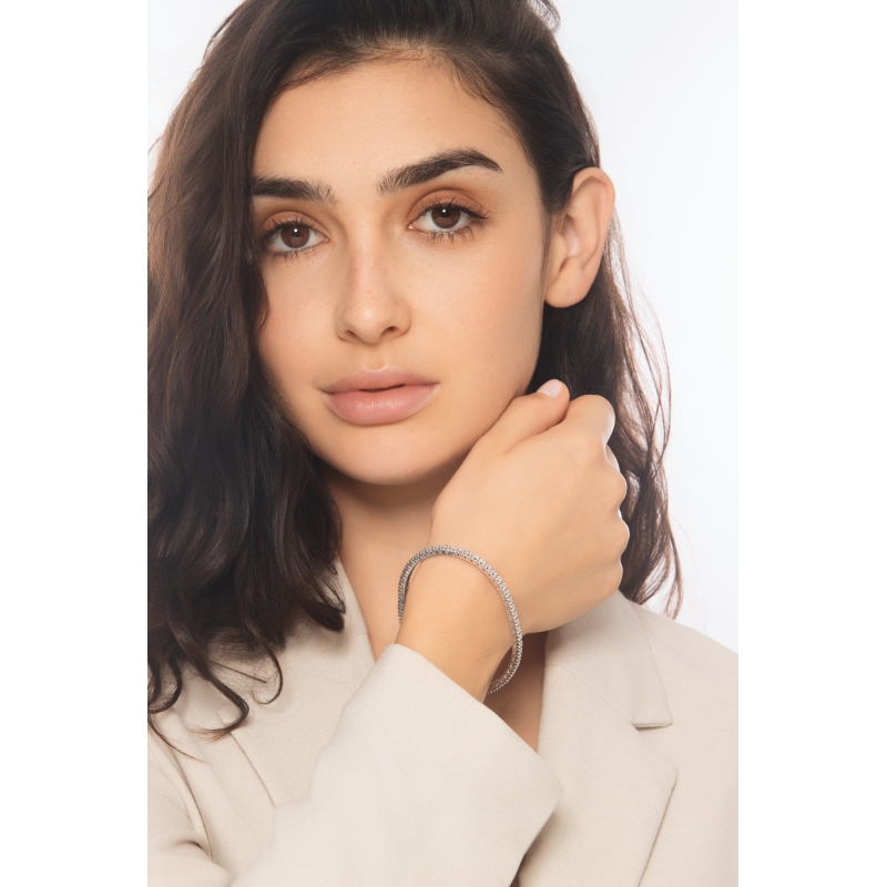 Bracelet tennis elastique en or blanc 750 avec diamants