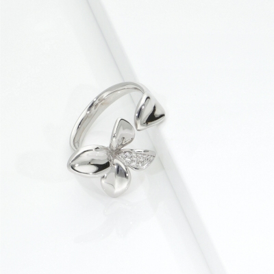 Bague ouverte fleur en or blanc et diamants