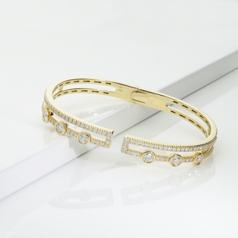 Bracelet semi rigide en or jaune 18k avec diamants