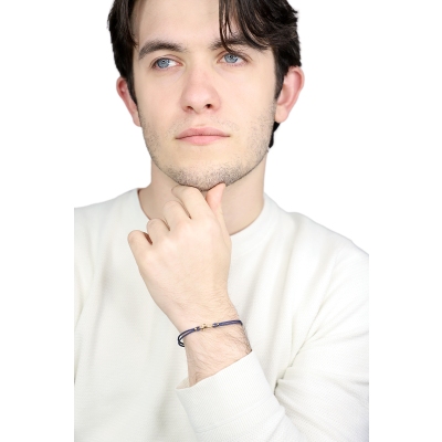 Bracelet en corde bleu avec ancre en or jaune 18k