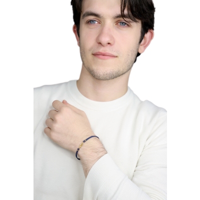 Bracelet en tissu bleu avec nœud en or jaune 18k