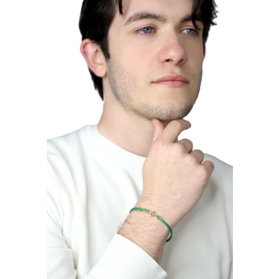 Bracelet en tissu vert et étoile en or jaune et blanc 18k